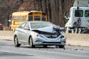 Car crash accident on a highway during the day with no traffic around.